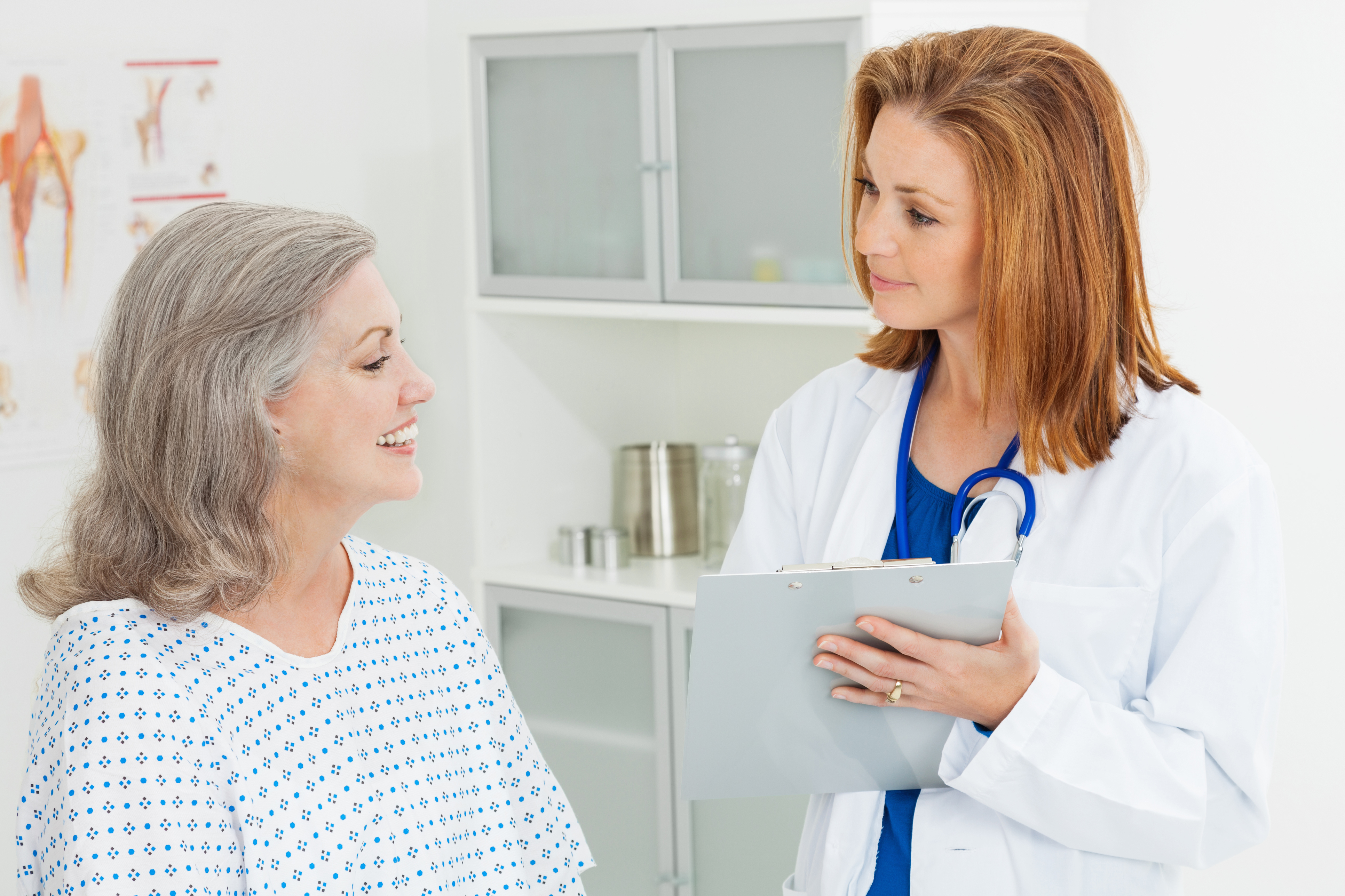 Doctor talking with patient