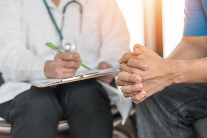 Male patient having consultation with doctor