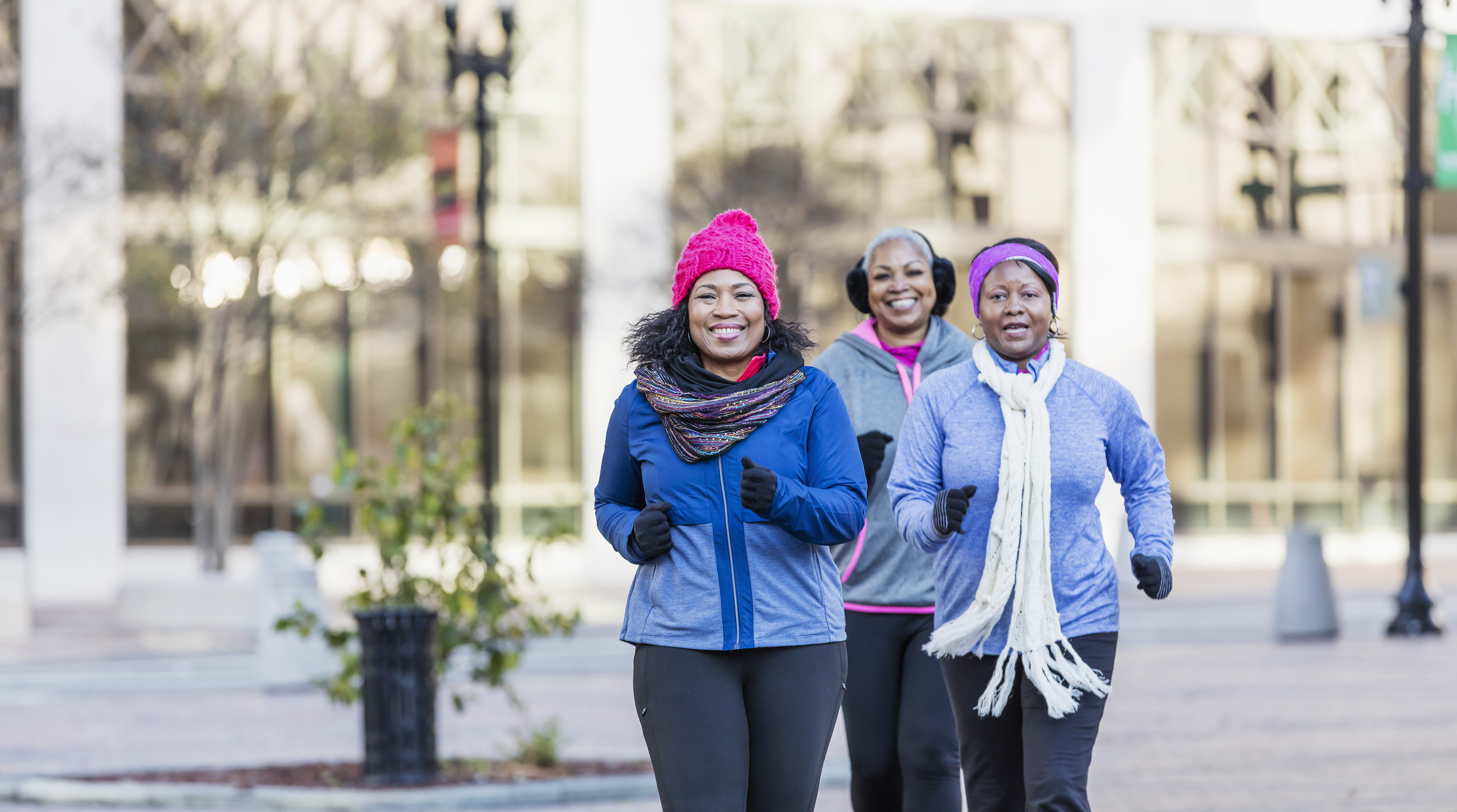 Three women walking in cold weather