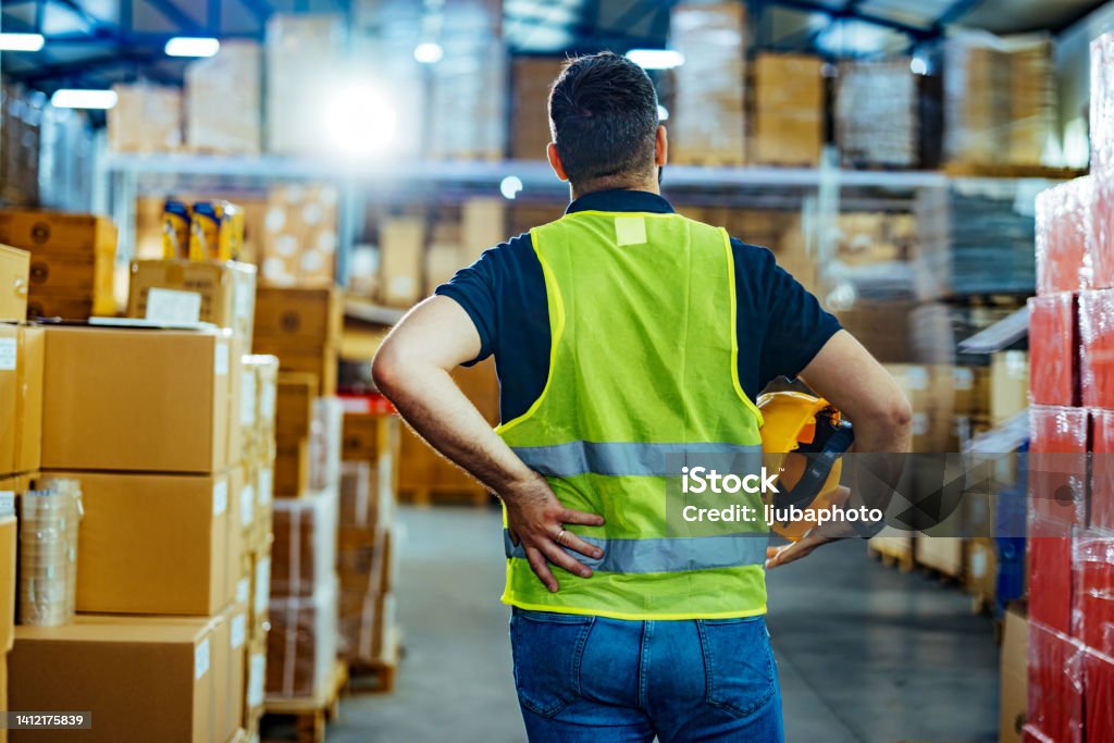 Warehouse worker with sore back