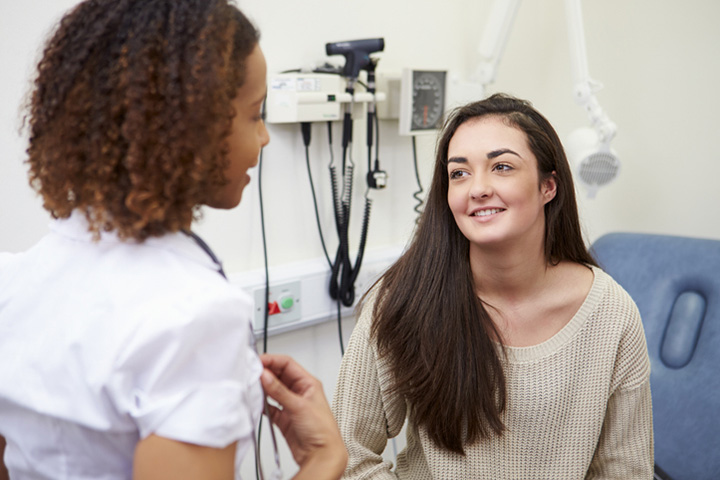 Woman meeting with doctor
