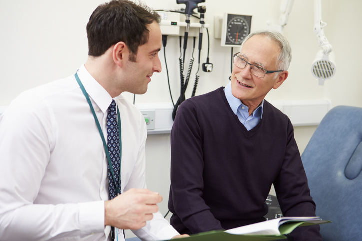 Man speaking with a doctor