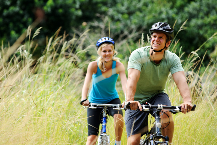 Couple riding bikes