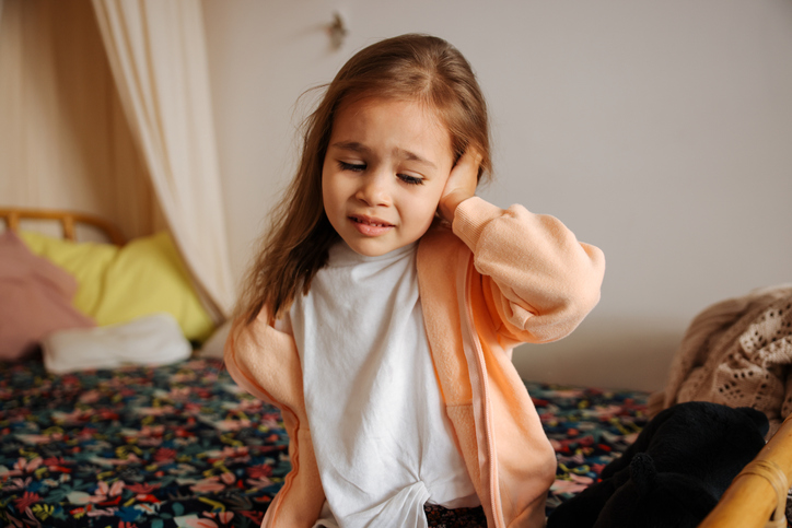Girl with ear infection