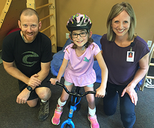 Olivia test drives a new Strider bike