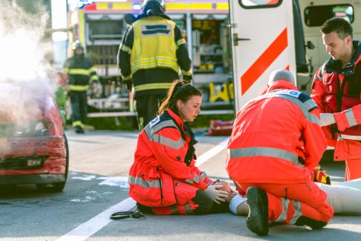 Emergency medical technicians on an accident scene