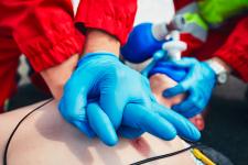 EMS technicians in the back of an ambulance