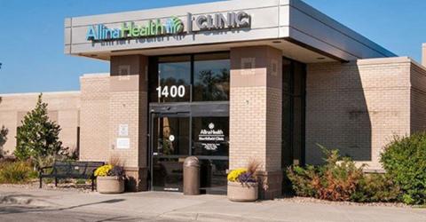 Front entrance of clinic building with Allina Clinic signage