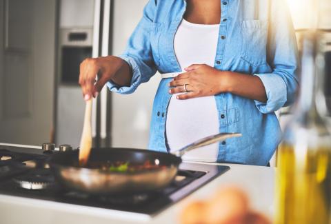pregnant women cooking food