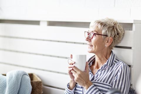 Woman sipping coffee